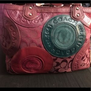 Beautiful rare purple colorful eyes coach bag .